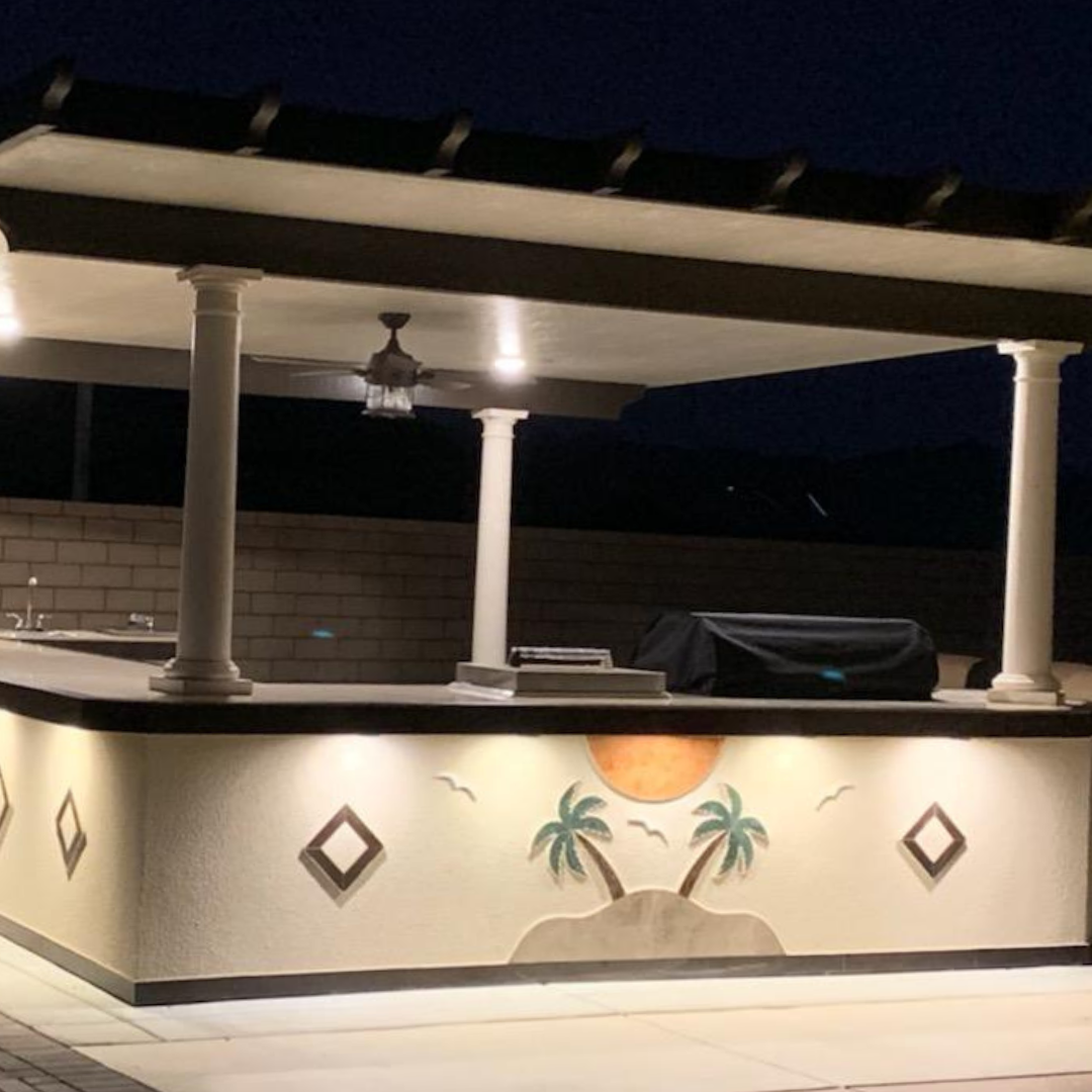 Outdoor kitchen with LED lighting at night