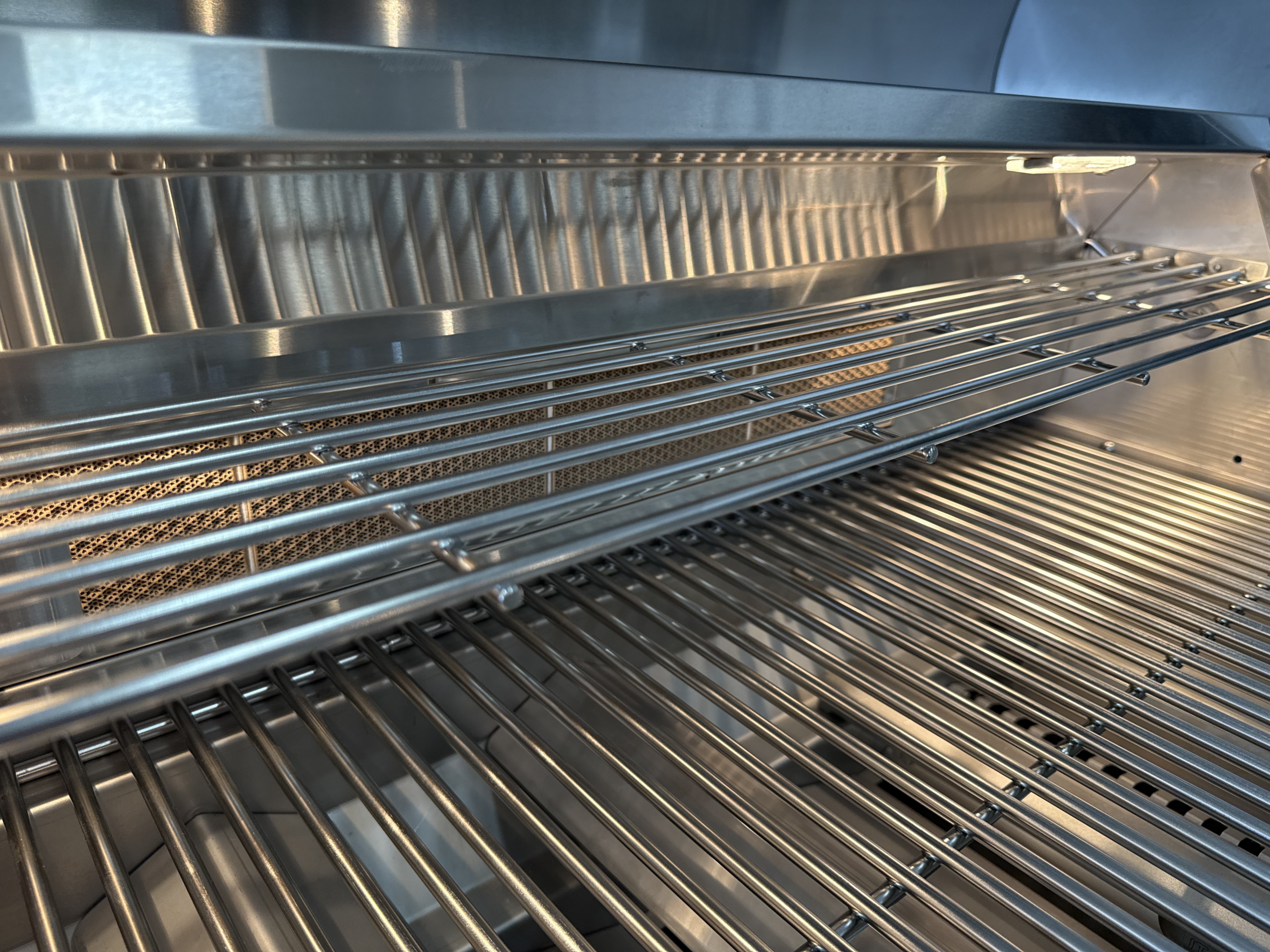 Lion Premium Grill warming rack for resting garlic butter lobster tails after grilling