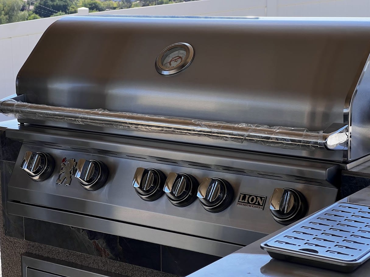 Lion L90000 40-inch gas grill used to grill a ribeye on a gas grill
