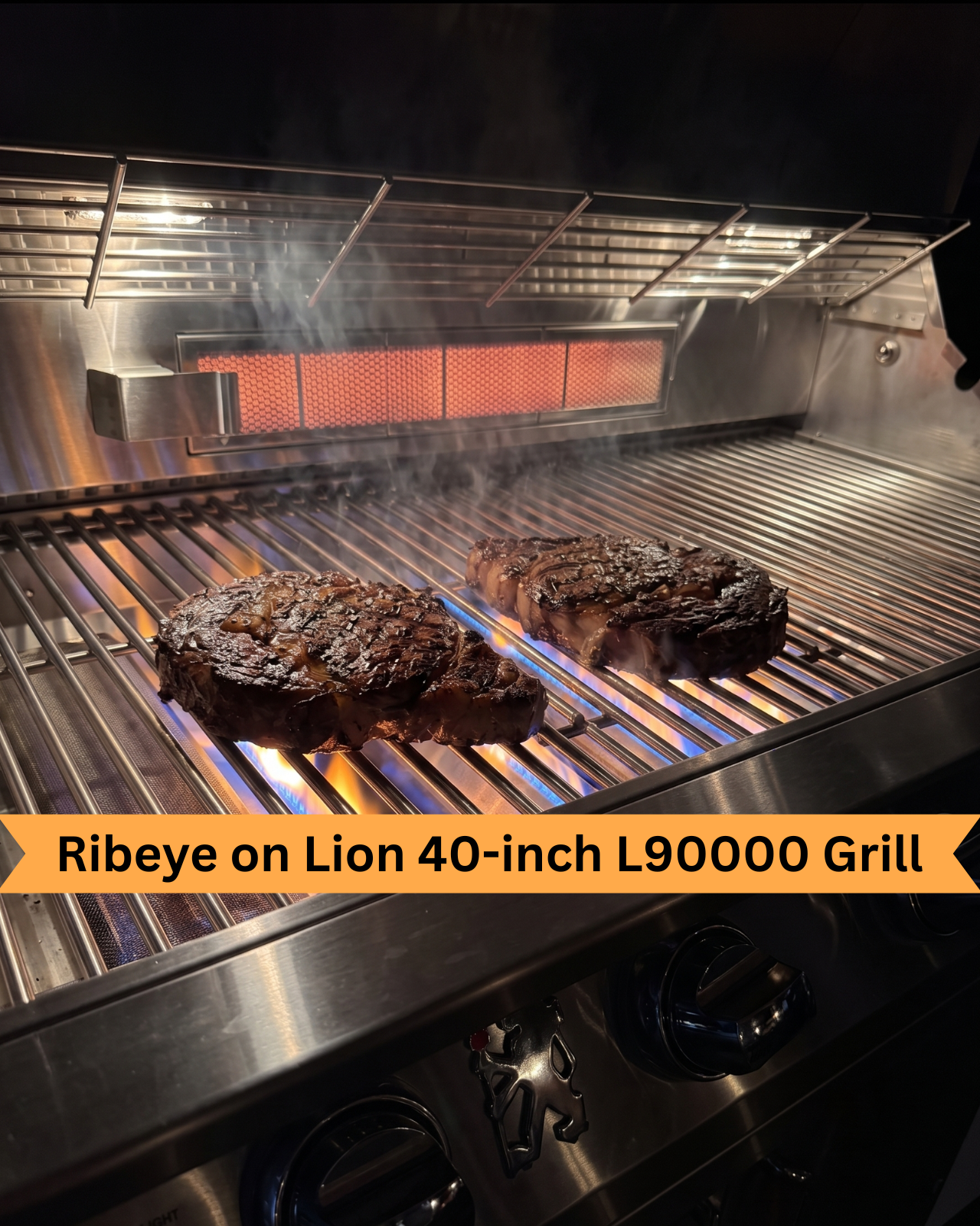 How to grill a ribeye on a gas grill: two ribeye steaks searing on a Lion 40-inch LP9000 gas grill
